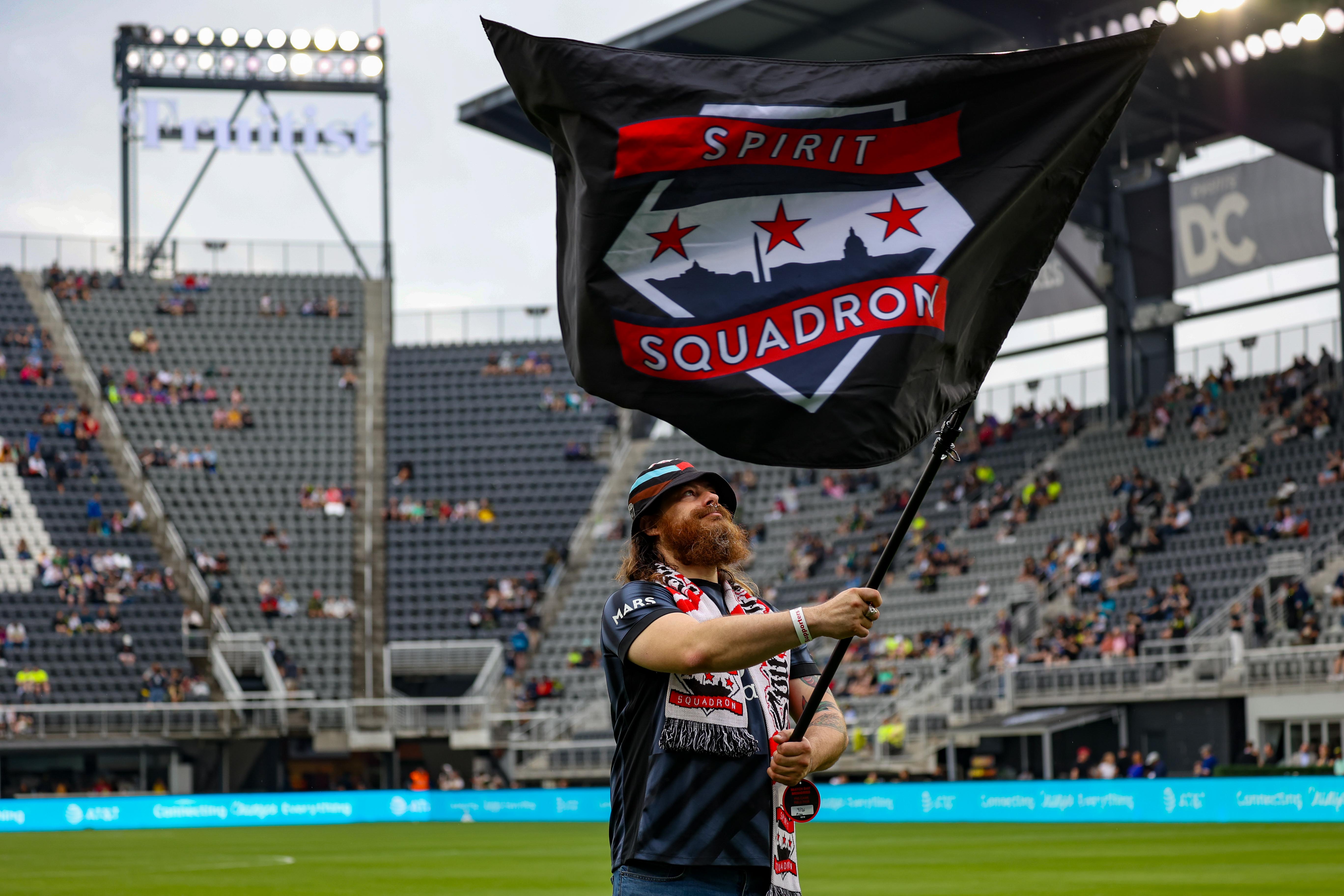 Photo of Spirit Squadron crest on a flag at Audi Field, 04/02/2025 against Gotham FC